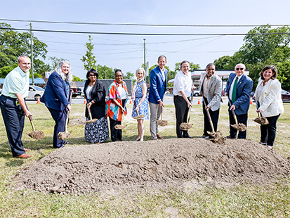 Group with shovels at groundbreaking