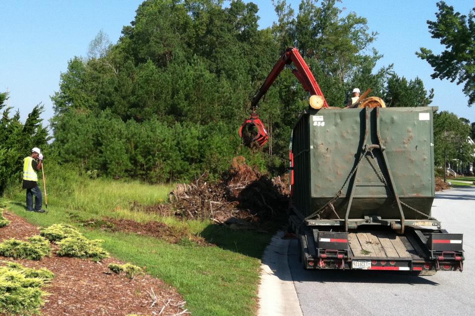 Contractor Cleaning Debris After Irene