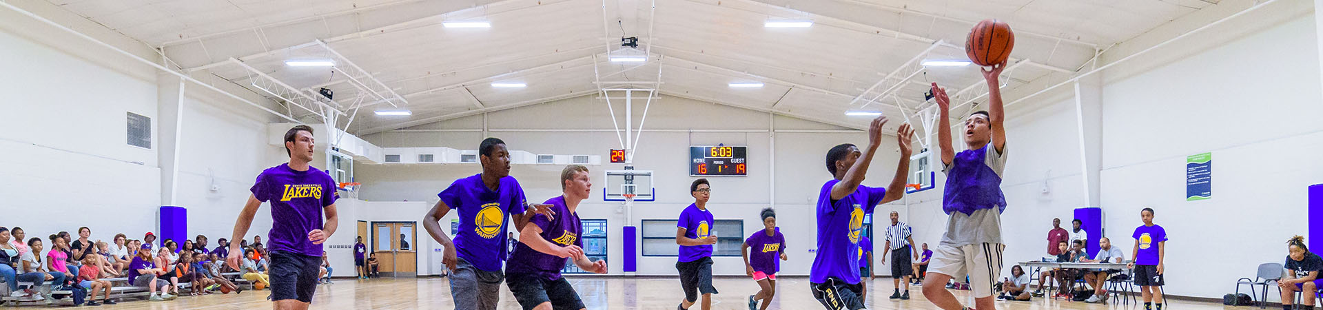 Basketball player shooting layup