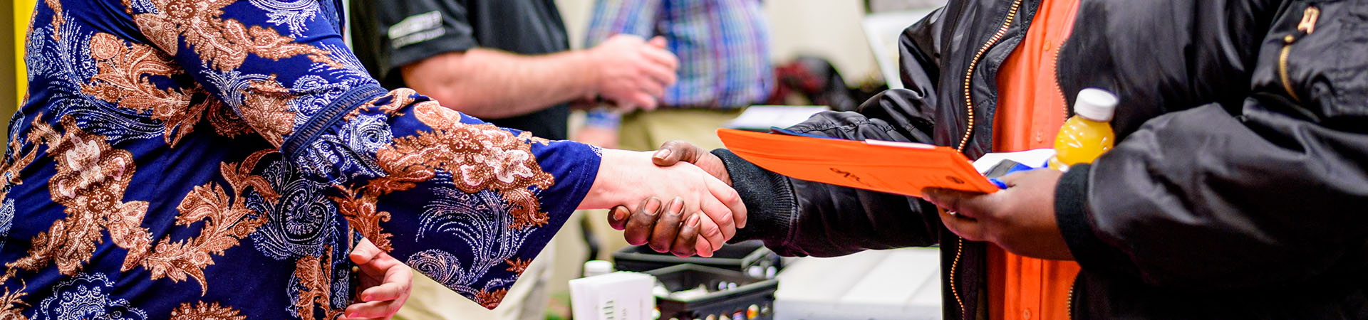 two people shaking hands