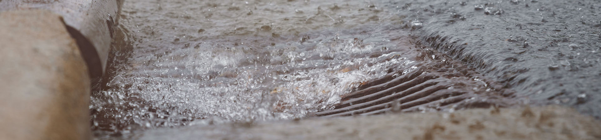 water running in storm drain